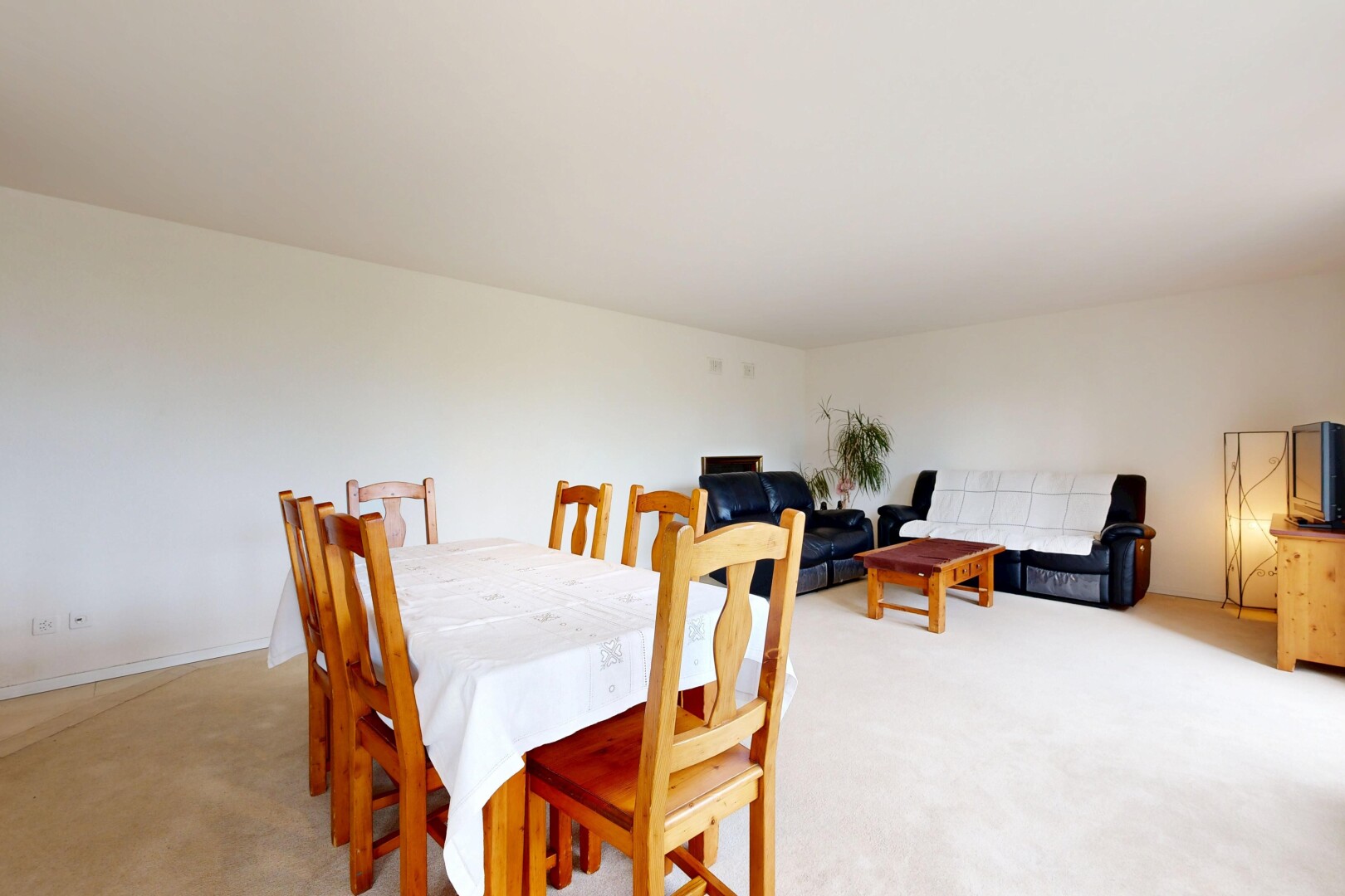 living room with light colored carpet