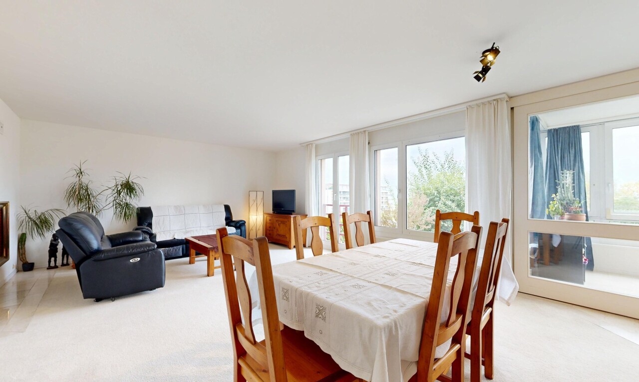 living room featuring light colored carpet