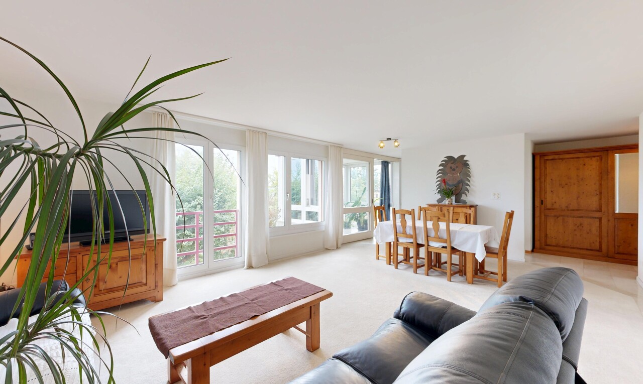 living room with light colored carpet