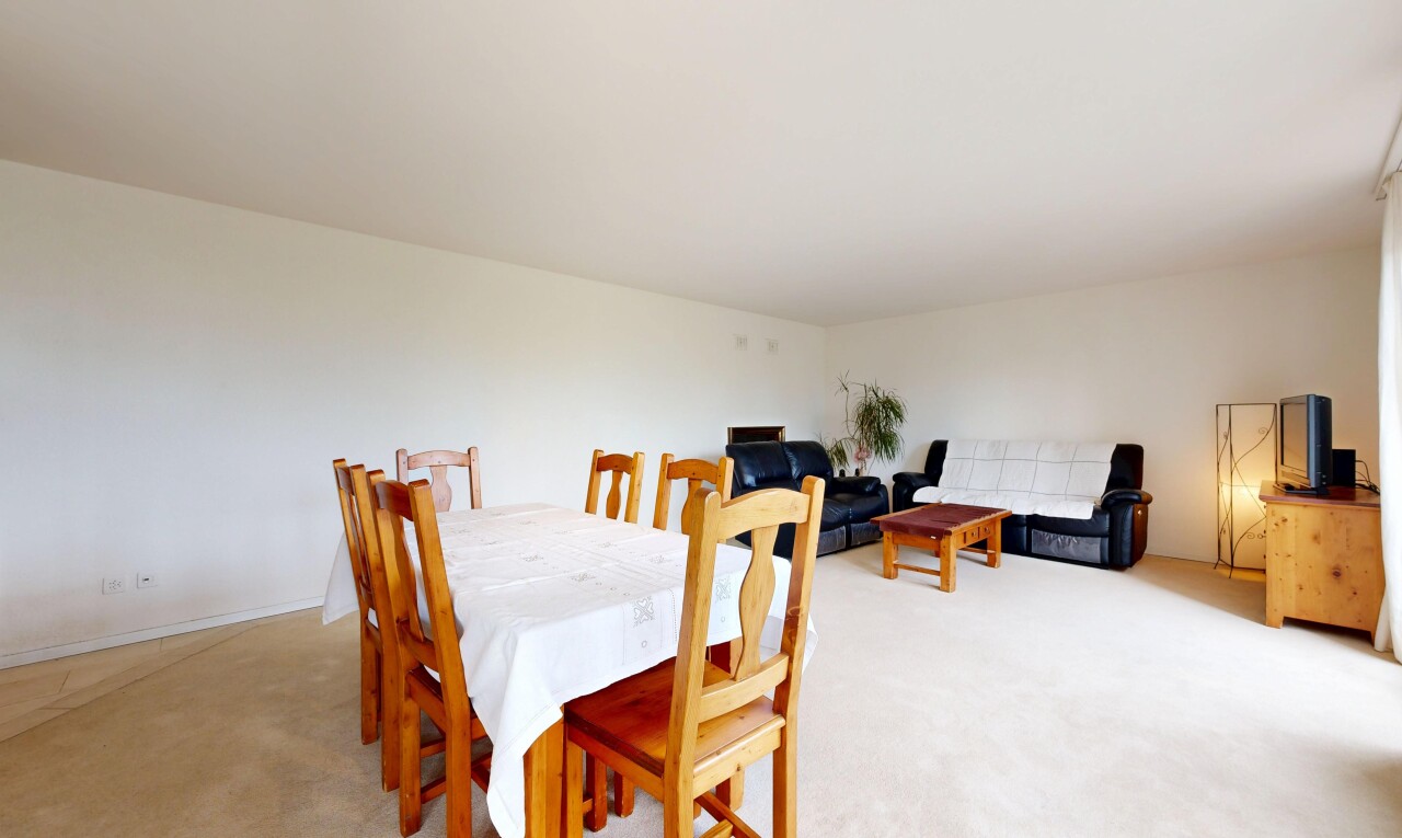 living room with light colored carpet