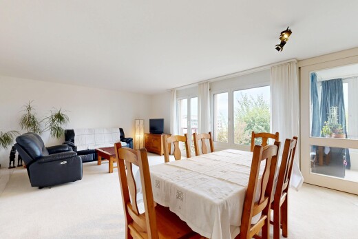 living room featuring light colored carpet