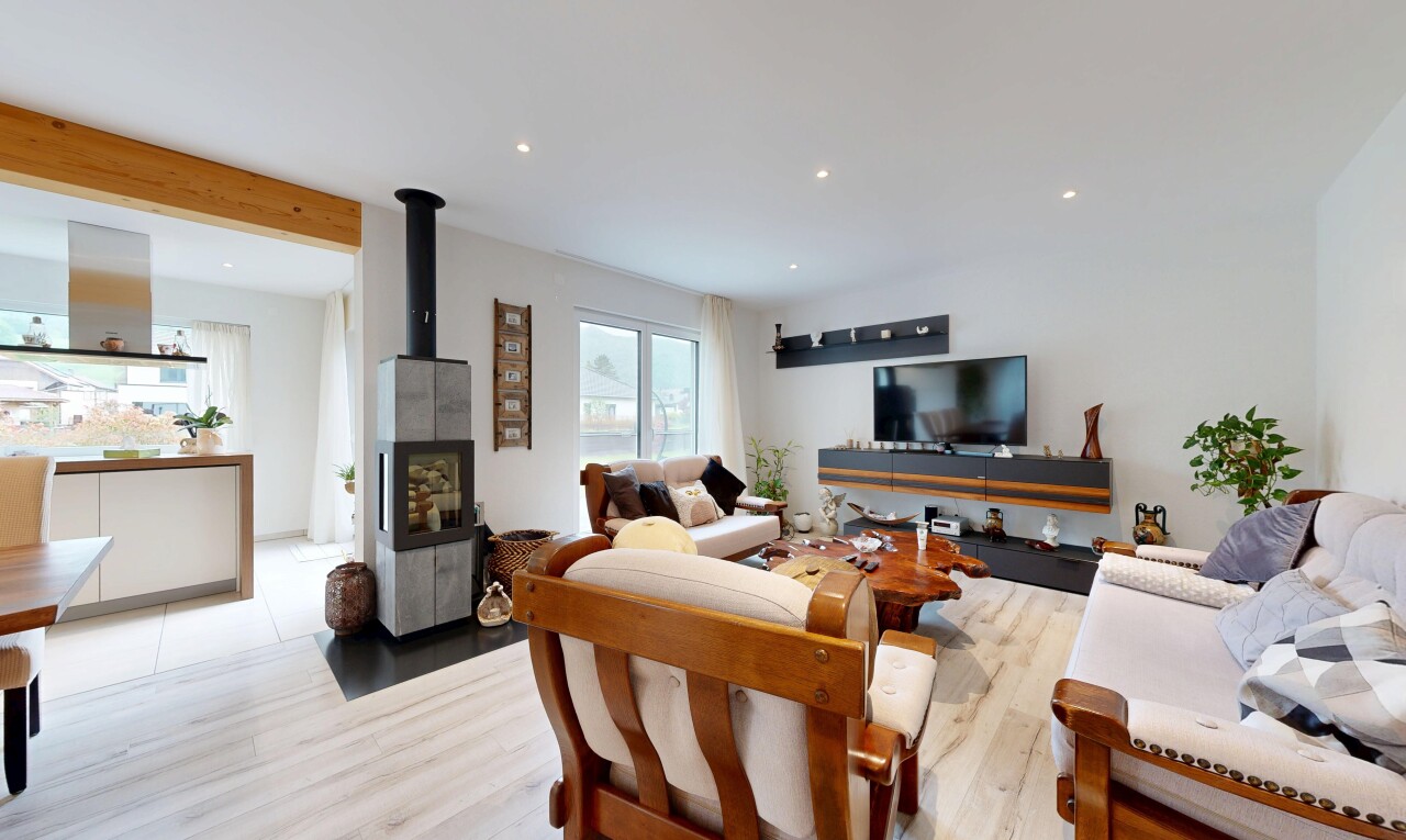 wohnzimmer mit gipskartonwand, drywall, holzfußboden, wood finish floor, und inside property