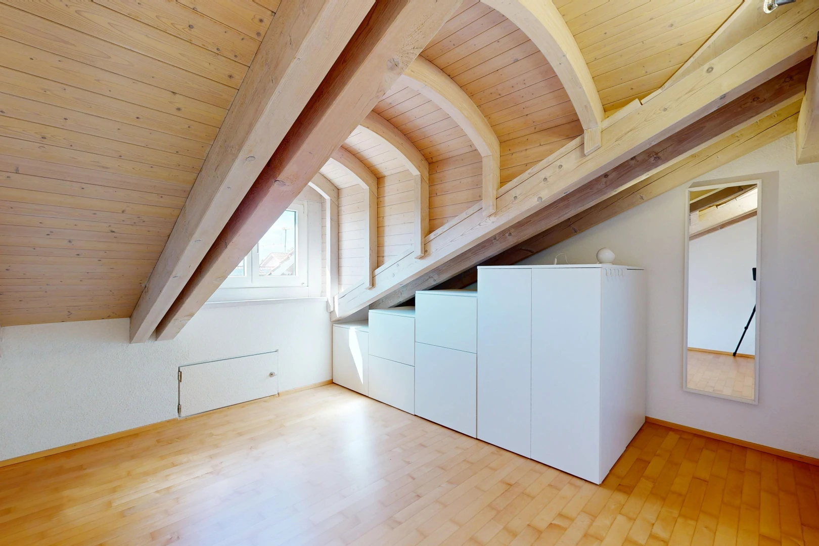 unfurnished room featuring wooden ceiling, light wood-type flooring, and vaulted ceiling with beams