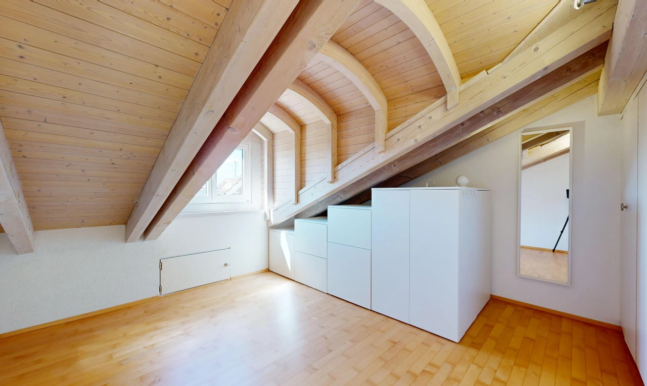 unfurnished room featuring wooden ceiling, light wood-type flooring, and vaulted ceiling with beams