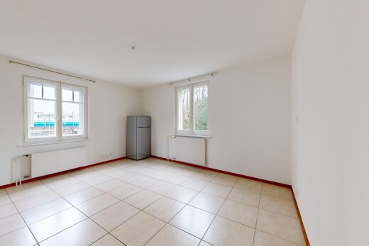 pièce vide avec drywall, cloison sèche, natural light, lumière naturelle, et baseboards wall