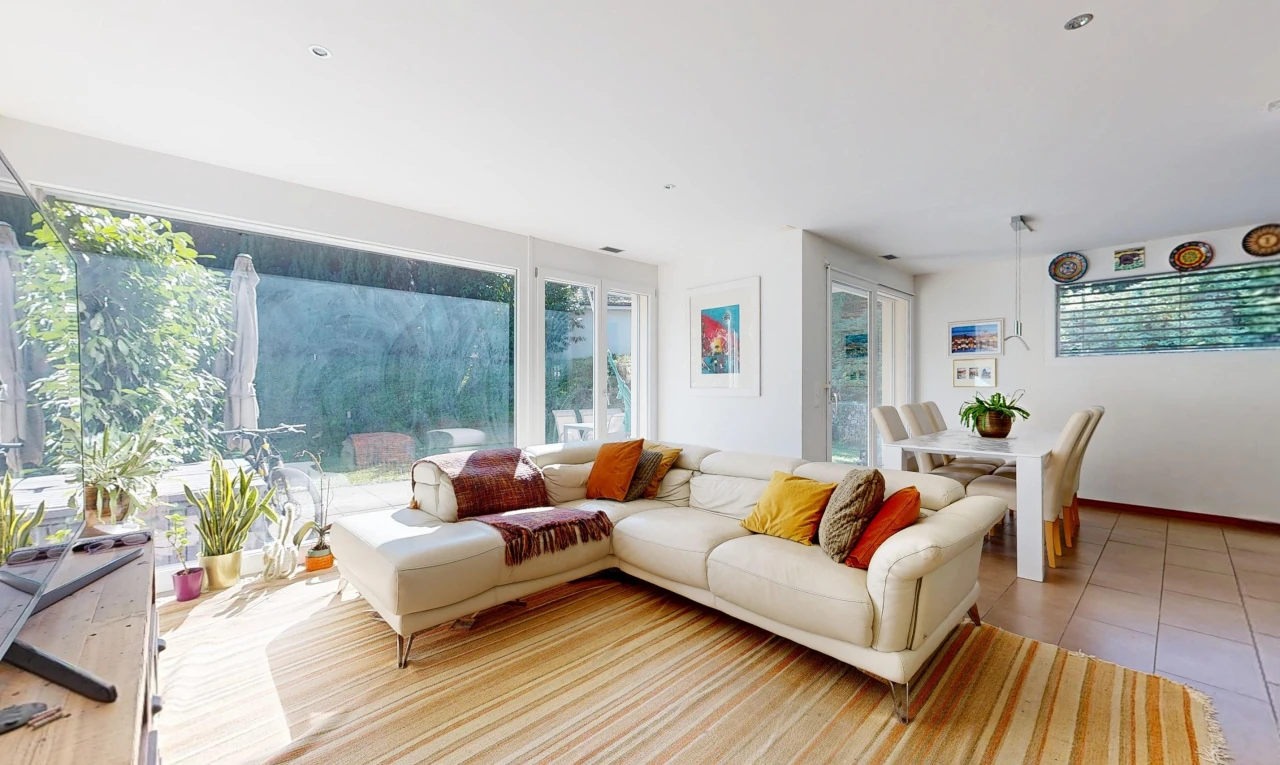 living / dining room featuring access to outside, recessed lighting, light tile patterned floors, and healthy amount of natural light