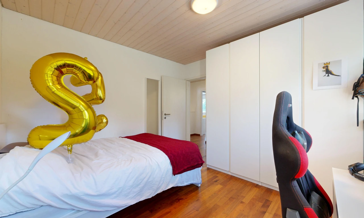 room / bedroom with an office area, light wood-type flooring, and wooden ceiling