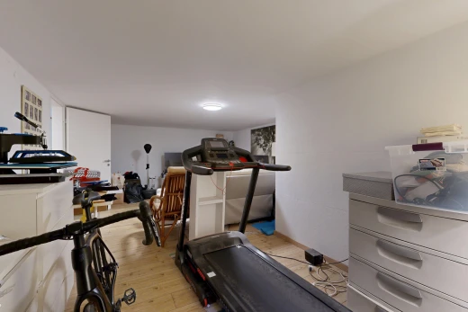 gym with light wood-type flooring