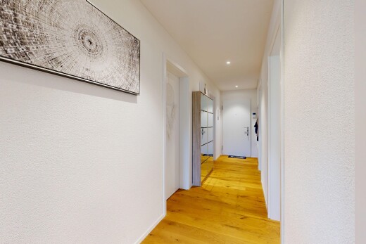hall with recessed lighting and light wood finished floors