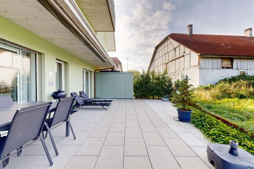 terrace with a patio area and outdoor dining space