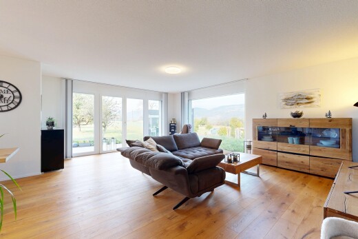 living area featuring light wood-type flooring and access to exterior