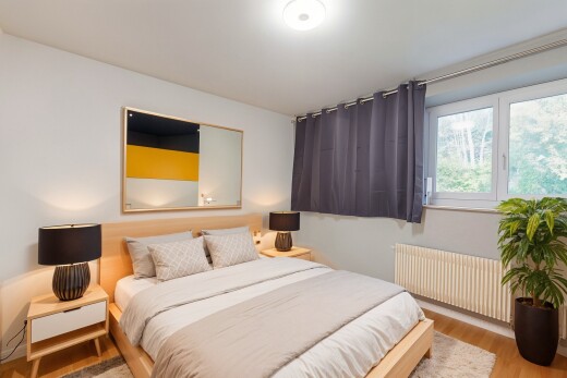 room featuring radiator heating unit and wood finished floors