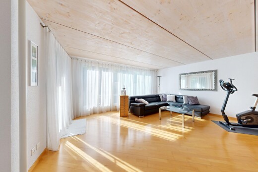 salon avec drywall, cloison sèche, wood finish floor, sol en finition bois, et inside property