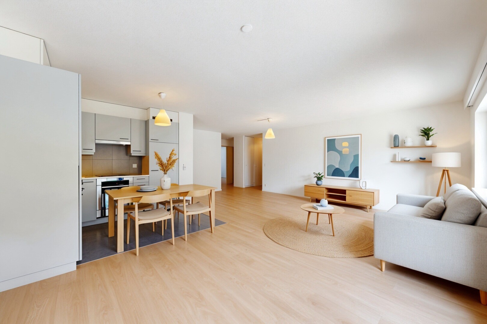 pièce vide avec inside property, sol en finition bois, wood finish floor, cloison sèche, et drywall