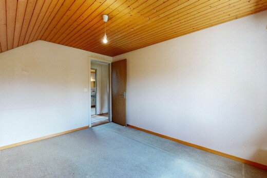 pièce vide avec inside property, cloison sèche, drywall, moquette, et carpet