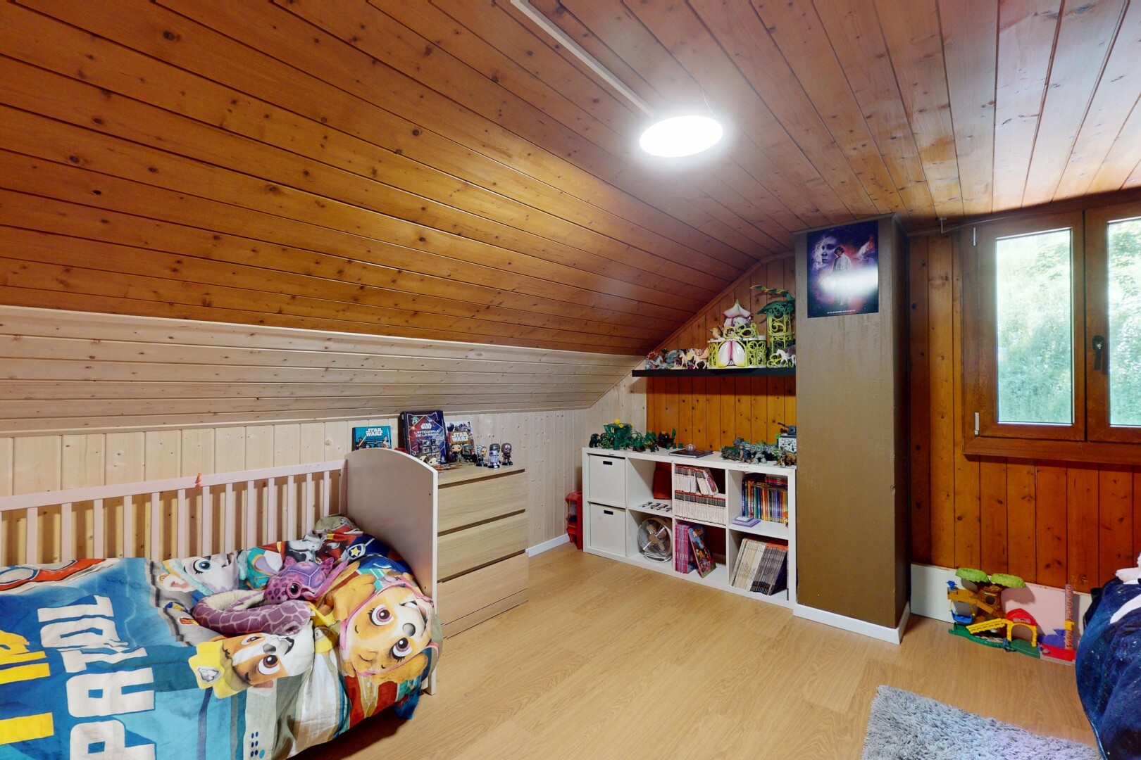 room / bedroom with wood ceiling, wood finished floors, vaulted ceiling, and wooden walls