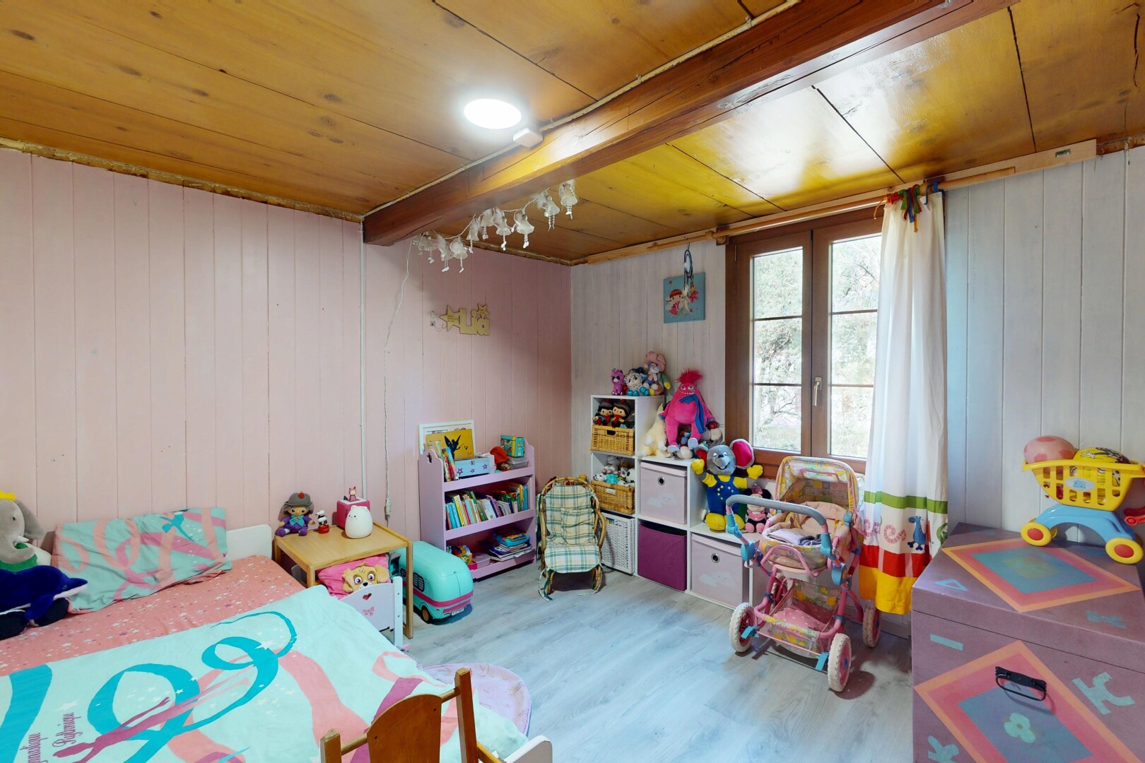room with wood finished floors, wood ceiling, and wood walls