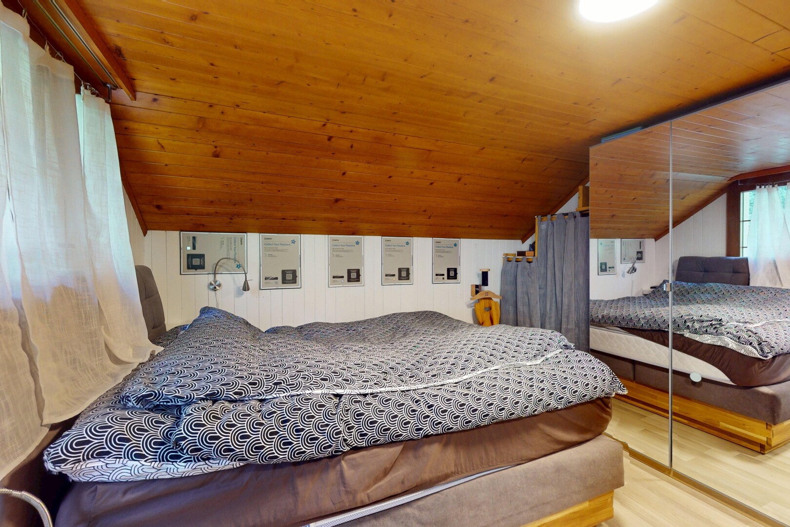 room with lofted ceiling, wood finished floors, and wooden ceiling