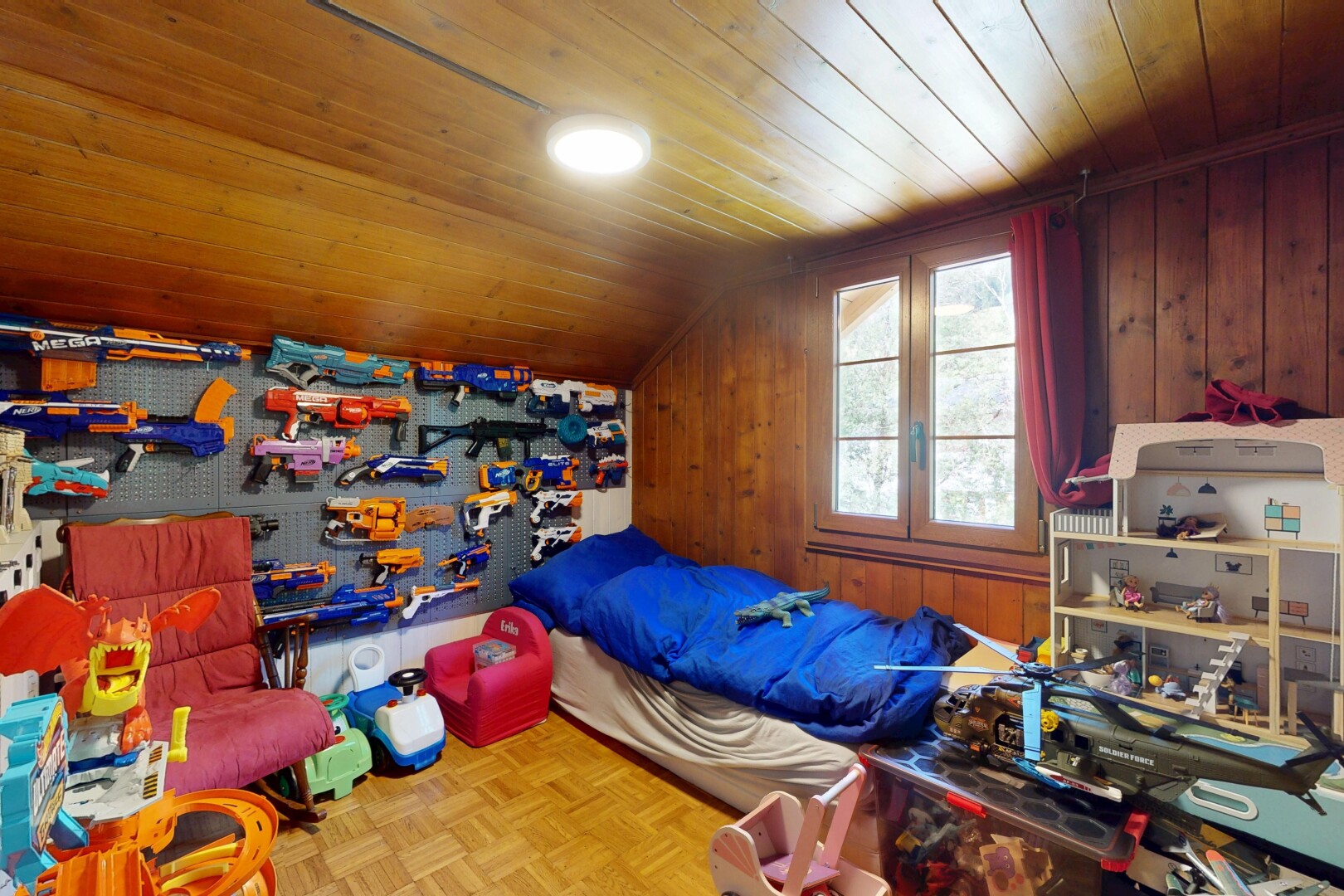 room / bedroom featuring wood ceiling, wooden walls, and lofted ceiling