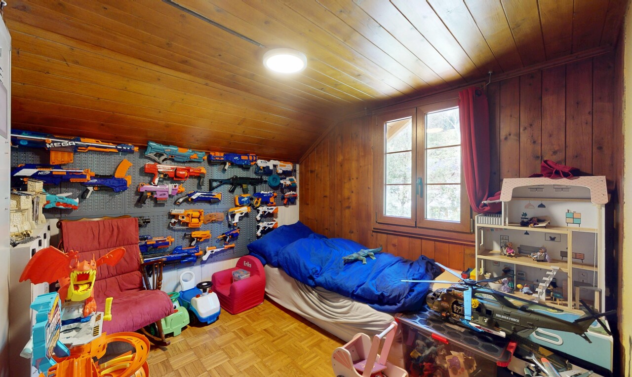 room / bedroom featuring wood ceiling, wooden walls, and lofted ceiling