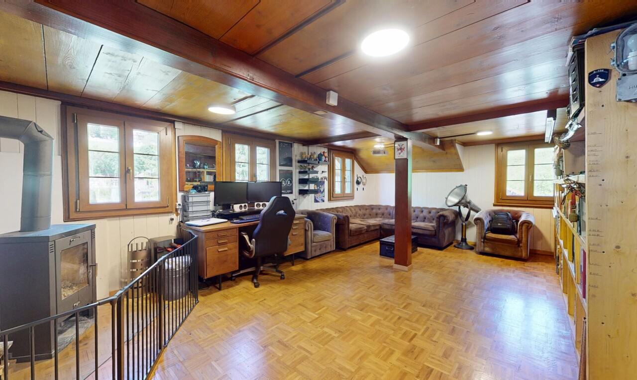 office featuring a wooden ceiling with exposed beams and healthy amount of natural light