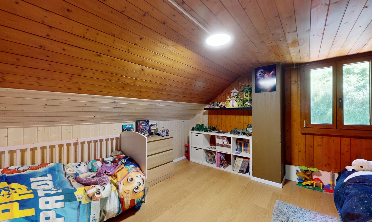 room / bedroom with wood ceiling, wood finished floors, vaulted ceiling, and wooden walls