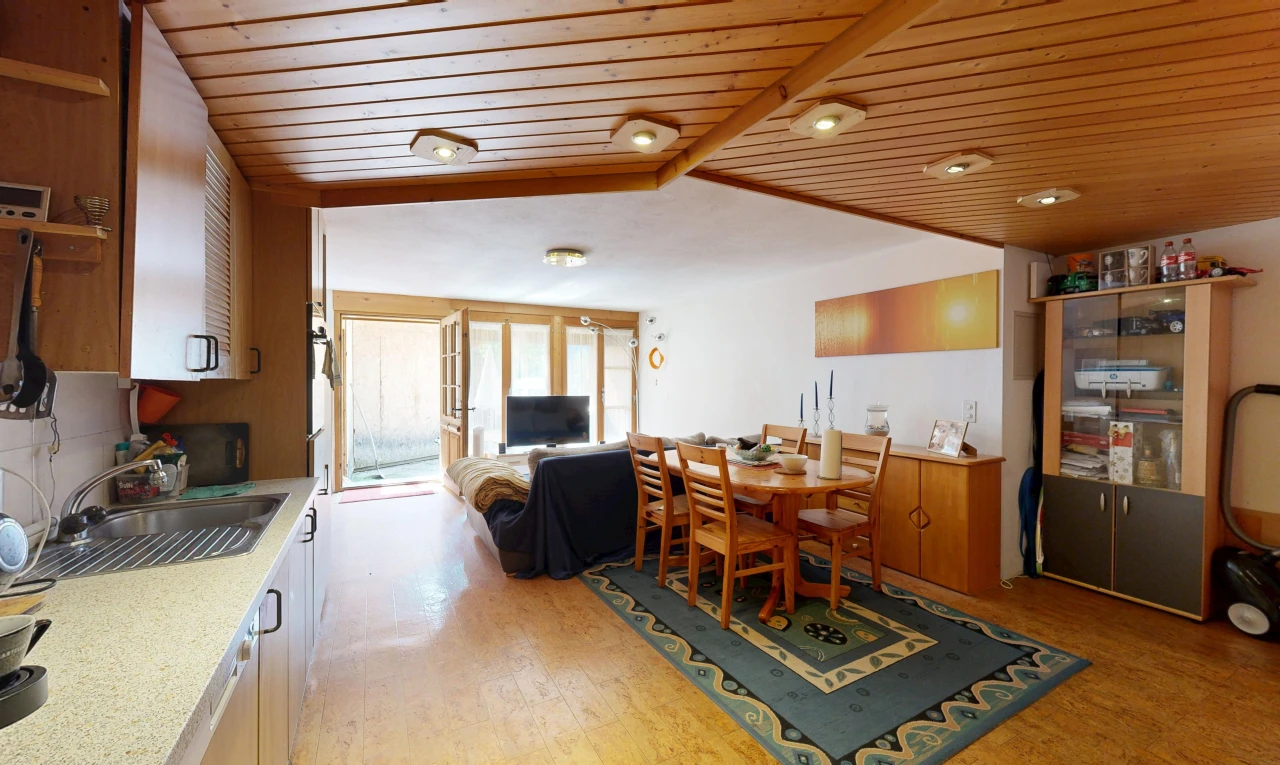 kitchen with wooden ceiling, light countertops, access to exterior, recessed lighting, and light wood finished floors