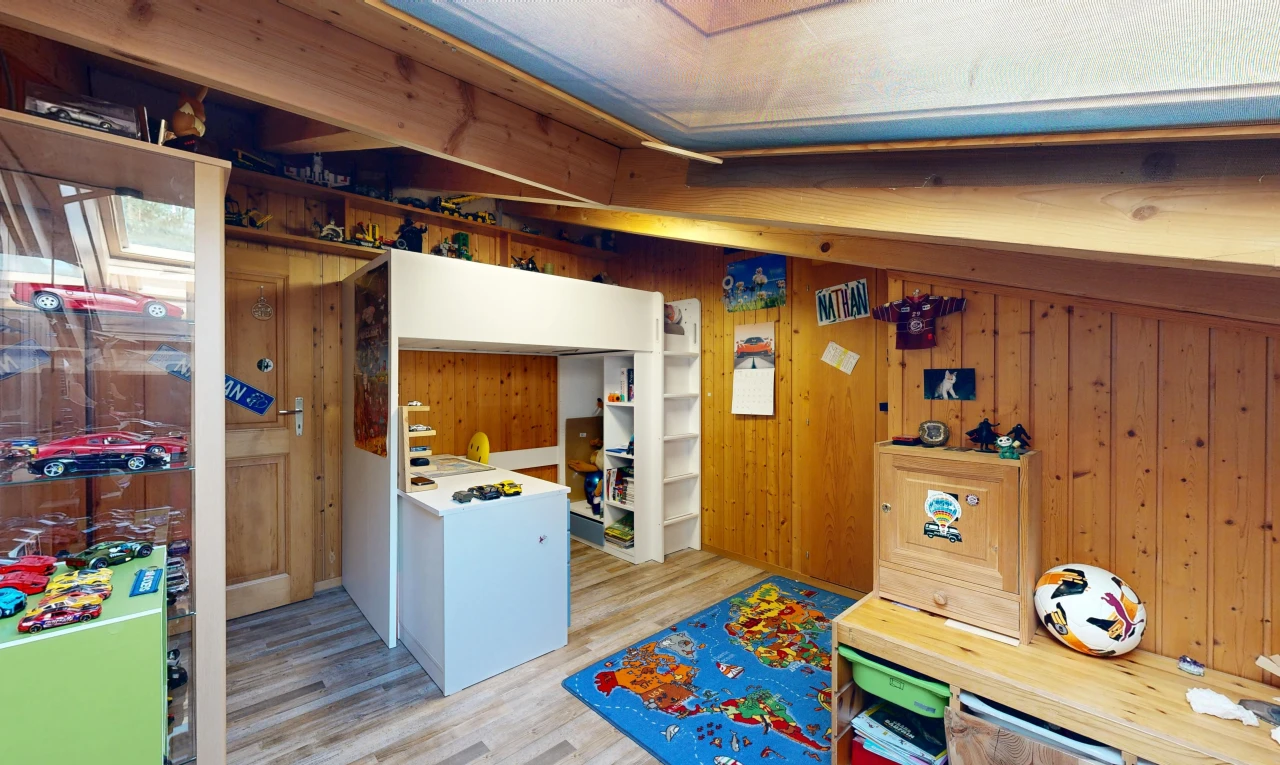 kitchen featuring light wood-type flooring and wood walls