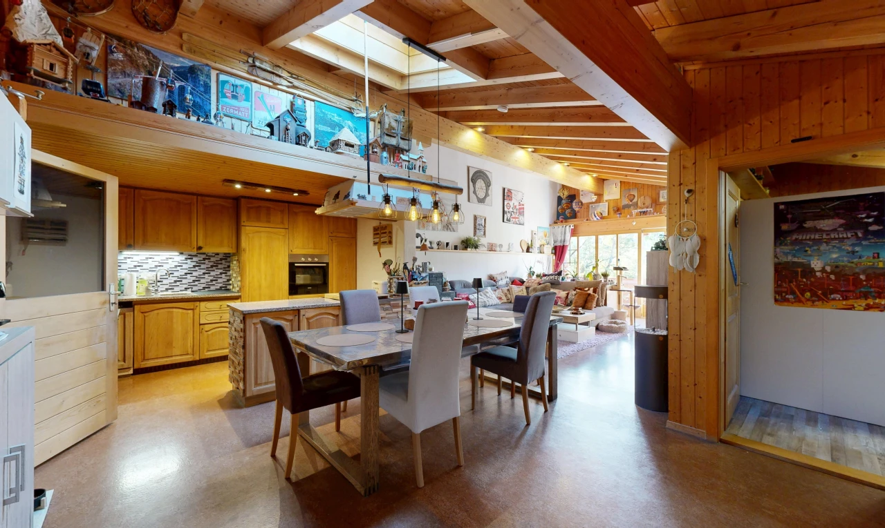 dining area featuring lofted ceiling with beams, wooden ceiling, and hanging light fixtures