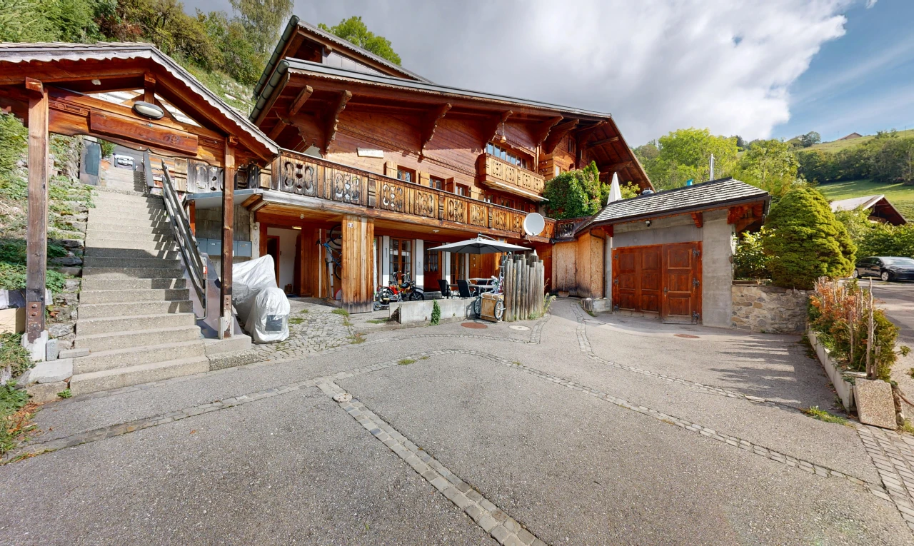 outdoor house featuring stairs