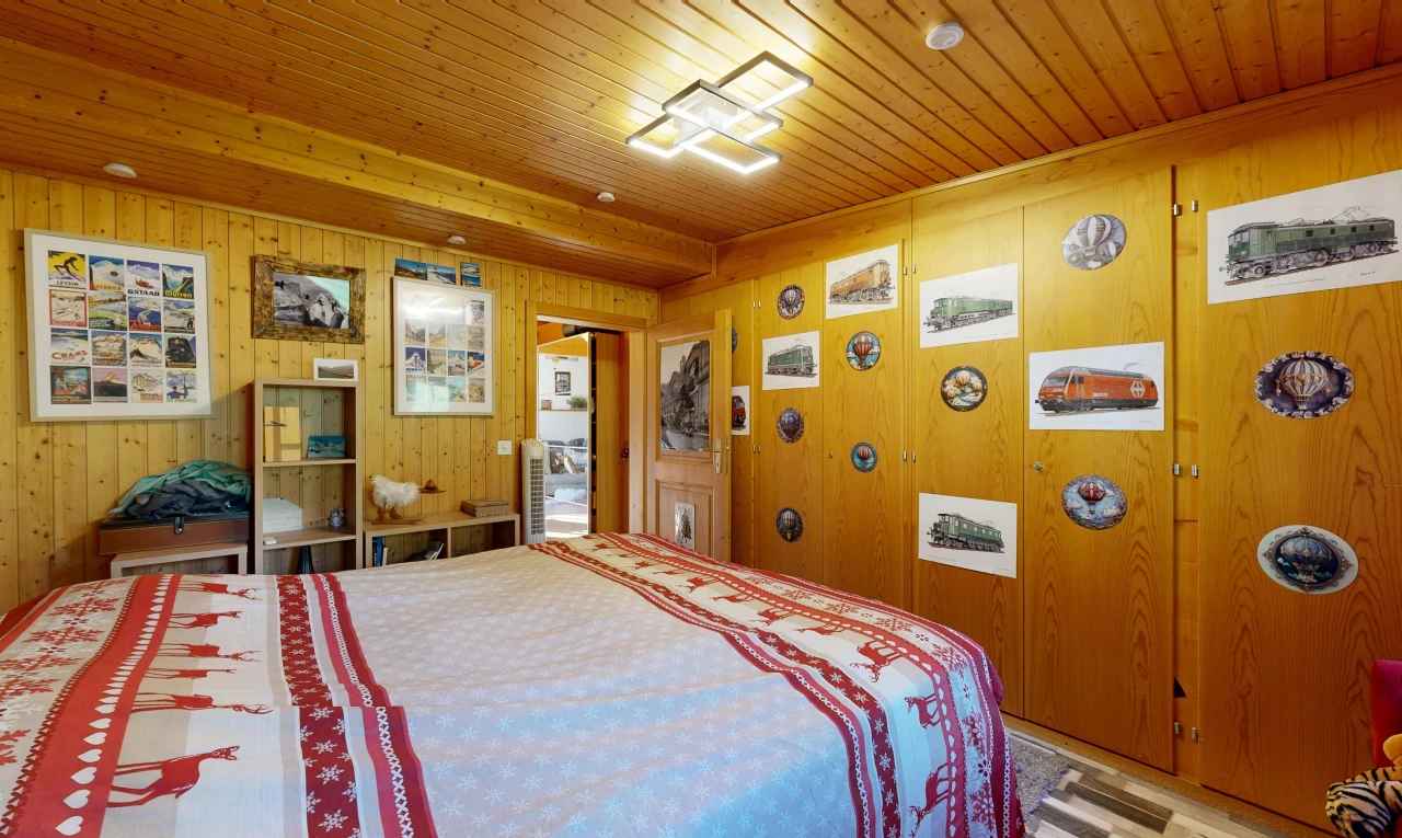 room featuring wooden walls and wood ceiling
