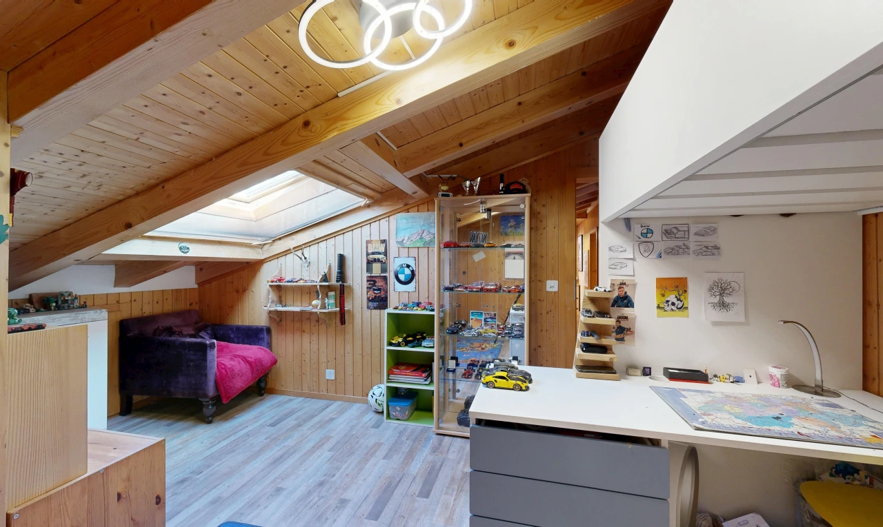 room / bedroom featuring lofted ceiling with beams, light wood finished floors, wooden walls, and wooden ceiling