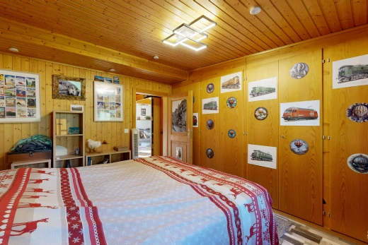 room featuring wooden walls and wood ceiling