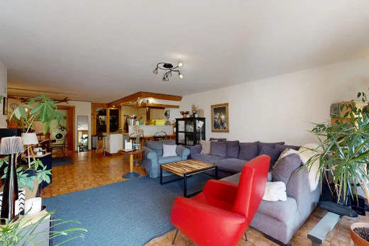 living room featuring track lighting