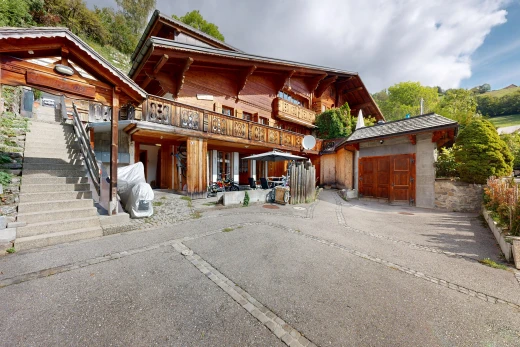 outdoor house featuring stairs