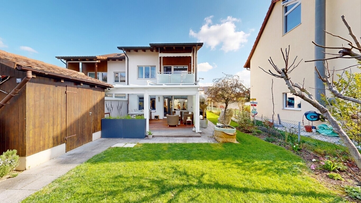 outdoor house featuring a balcony, stucco siding, a patio, and outdoor lounge area