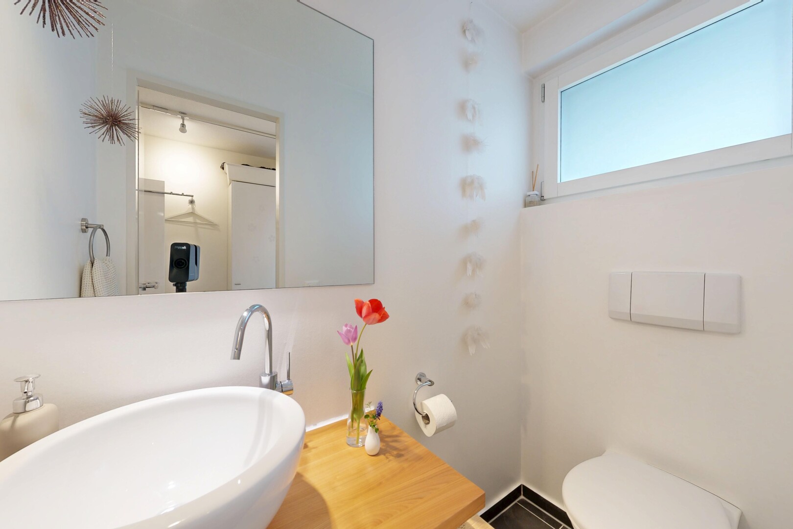 half bath featuring a sink