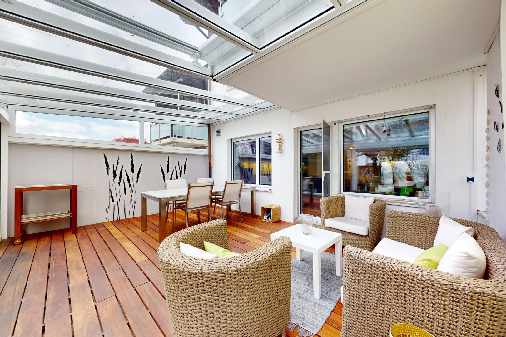 view of wooden deck featuring an outdoor living / dining area and a pergola