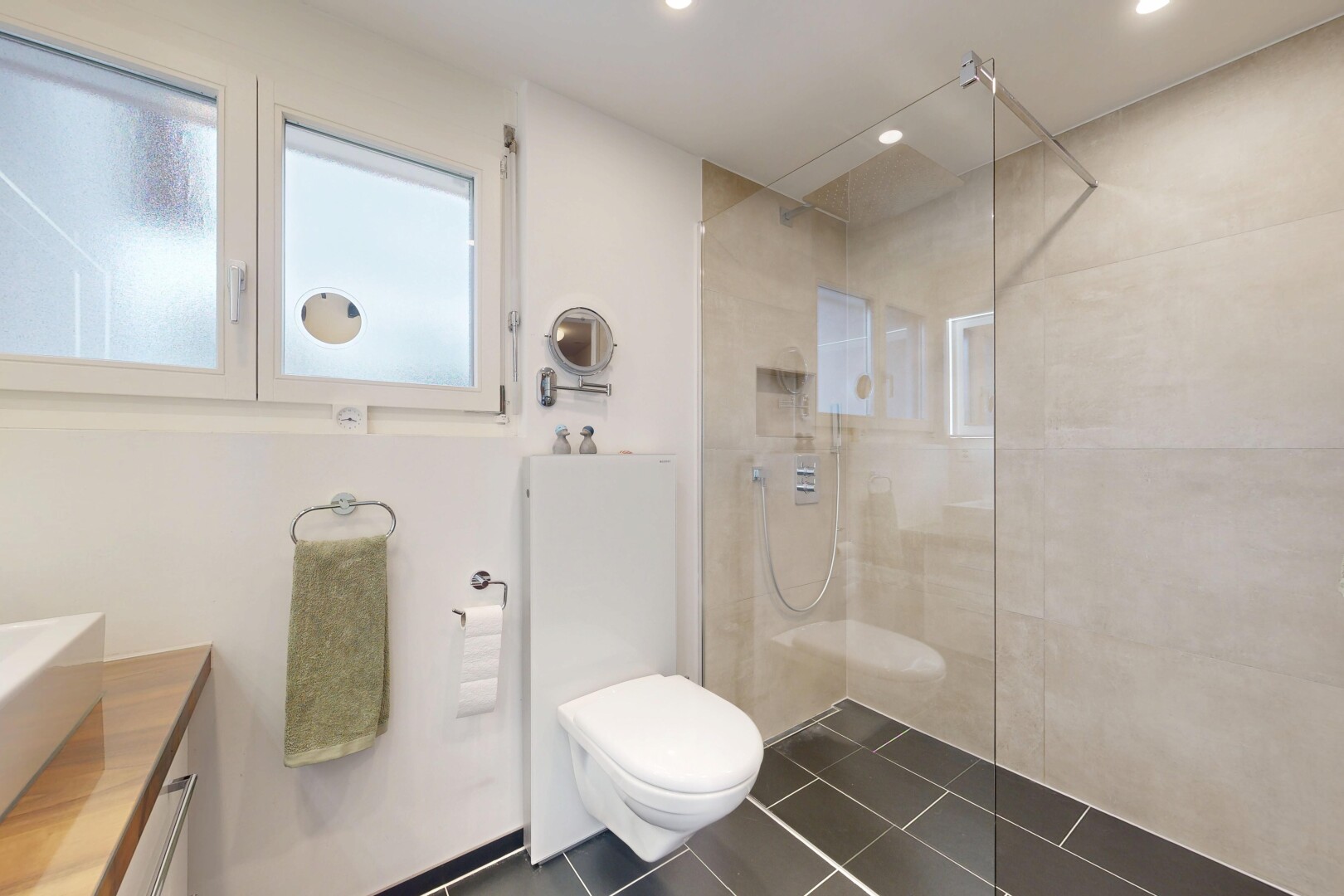 full bathroom with a walk in shower, vanity, recessed lighting, and dark tile patterned flooring