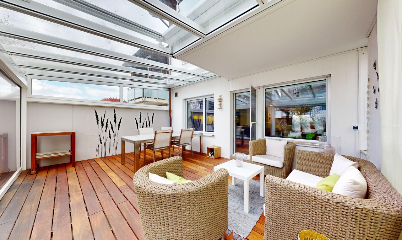 view of wooden deck featuring an outdoor living / dining area and a pergola