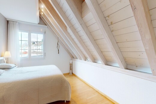 chambre avec cloison sèche, drywall, plafond à poutres, beamed ceiling, et inside property