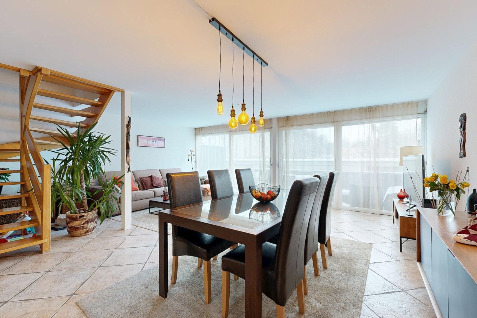 dining room with stairway and light tile patterned flooring
