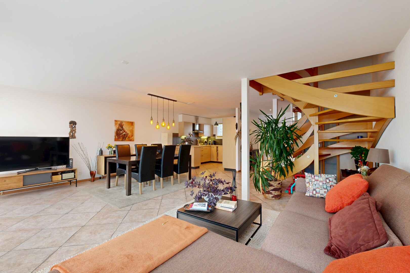 living / dining area with light tile patterned flooring
