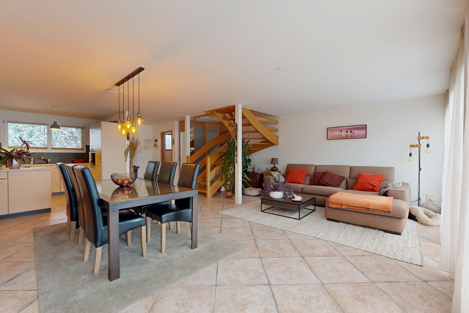 living room featuring stairs and light tile patterned floors