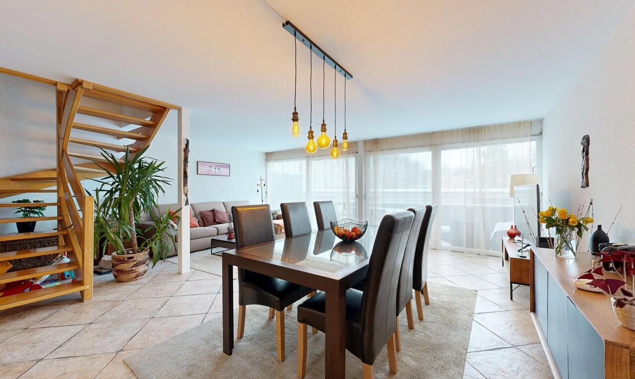 dining room with stairway and light tile patterned flooring