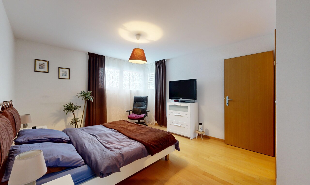 room with light wood-style floors