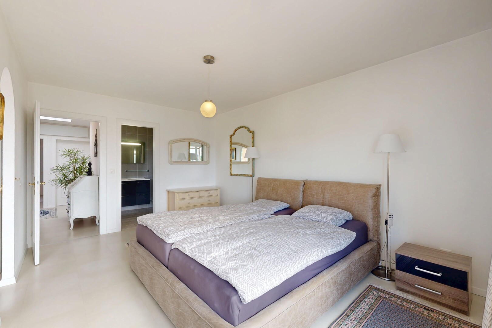 room / bedroom featuring ensuite bathroom