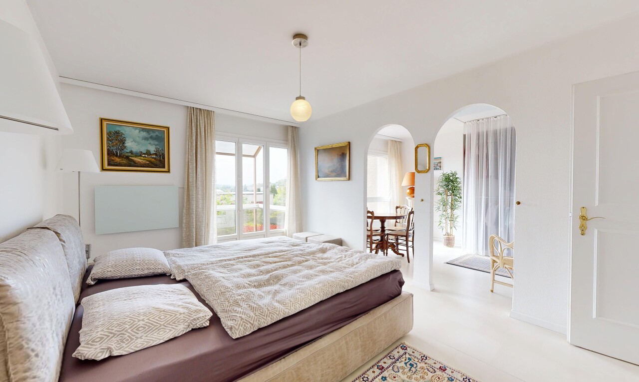 room / bedroom with arched walkways