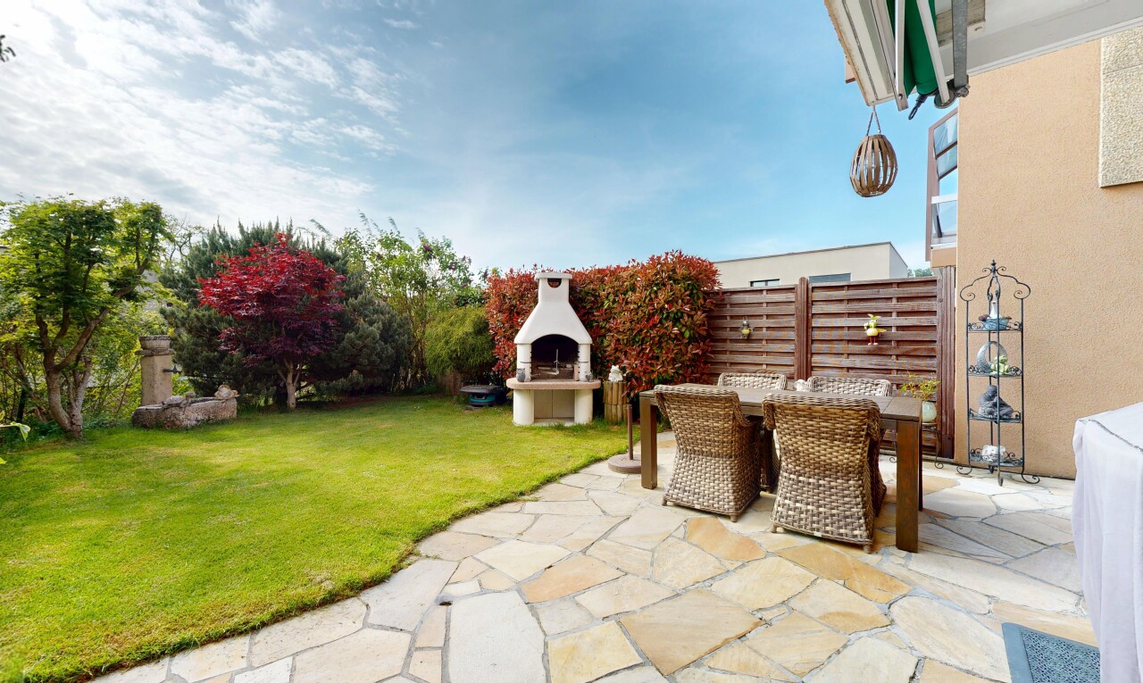 terrace featuring an outdoor fireplace, outdoor dining space, and a patio area