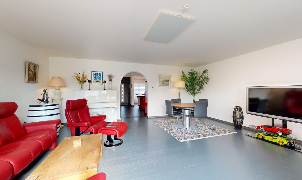 living area with arched walkways